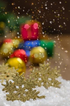 Christmas Decoration With Snow Over Wooden Background