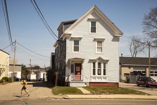 An old green building in Portland, Maine