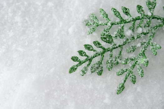 Winter background with Christmas decoration on snow