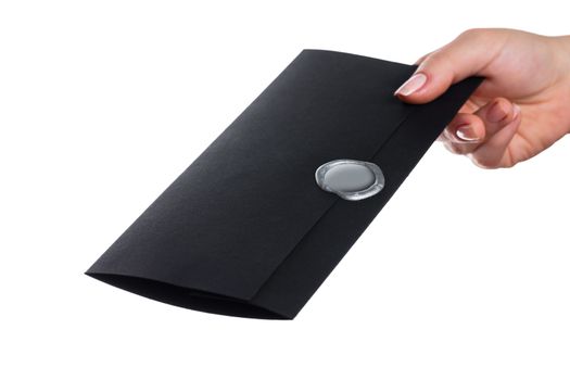envelope in the hand on a white background isolated