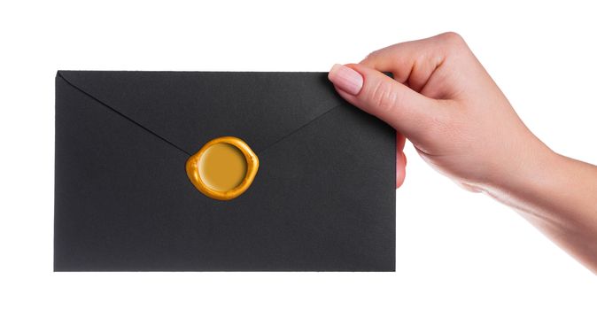 envelope in the hand on a white background isolated