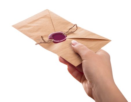 envelope in the hand on a white background isolated
