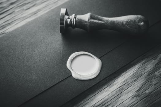 envelope with a stamp on the wooden background