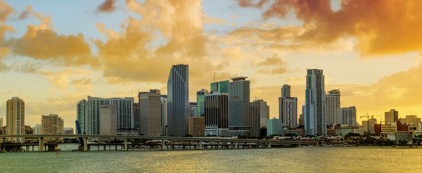 Panorama of Downtown Miami, Florida, USA, seen from MacArthur Causeway at sunset.