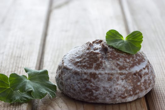 chocolate cake and mint on wooden table