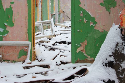 old ruined house covered with snow, apocalypse concept