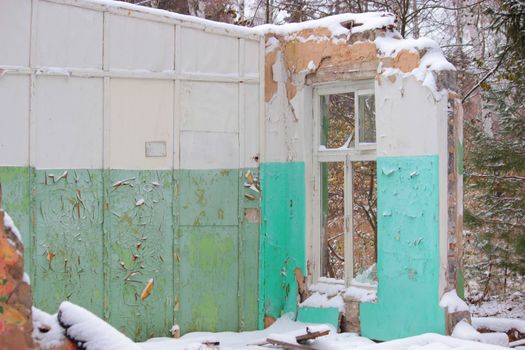 old ruined house covered with snow, apocalypse concept