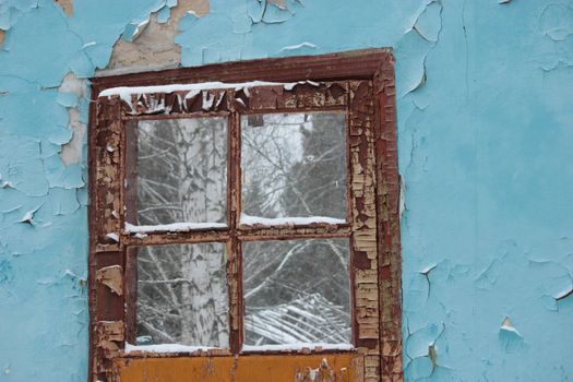 door in an old ruined house, blue wall