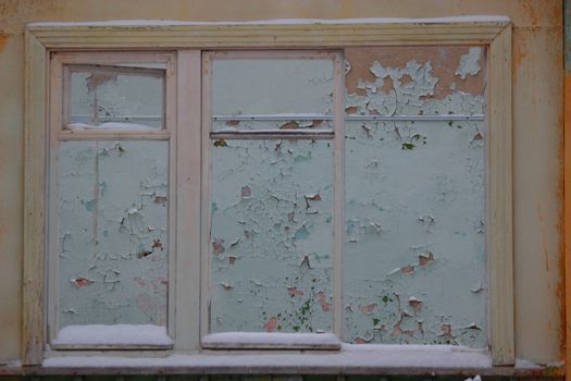 window in the abandoned house close up