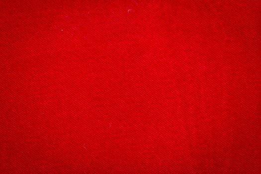 Rustic canvas fabric texture in red color.