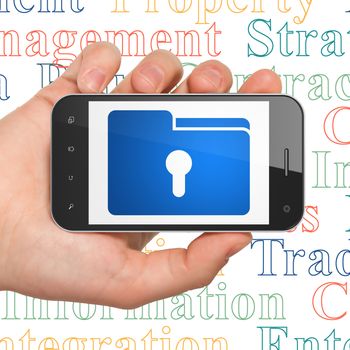 Business concept: Hand Holding Smartphone with  blue Folder With Keyhole icon on display,  Tag Cloud background, 3D rendering