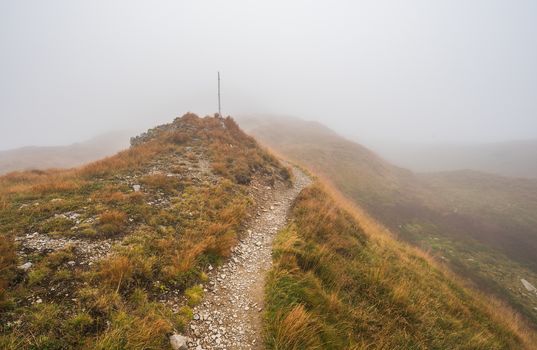 Hiking Trail on the Hill in the Mountains in the Mist