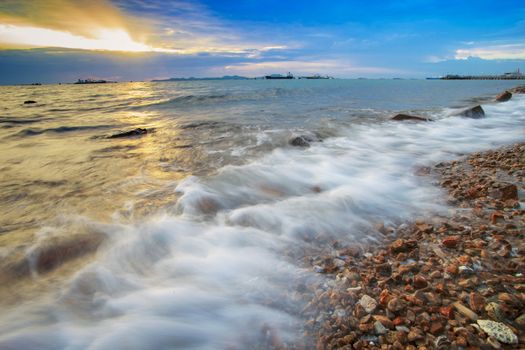 beautiful sea scape and sun set sky by long exposure photography process