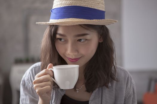beautiful asian woman and hot coffee cup happiness smiling face