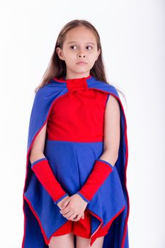 Girl in blue and red superhero costume with worried look