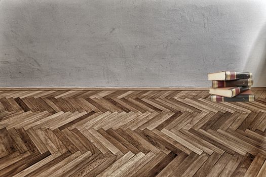 heavy book on parquet floor 