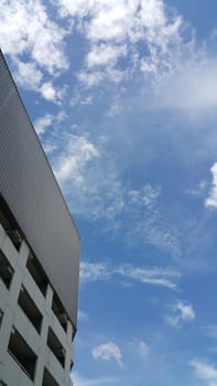 Car park building and blue sky.