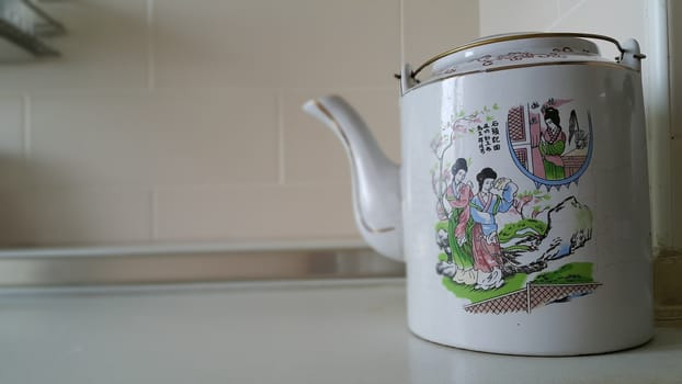 Chinese tea pot in the kitchen.