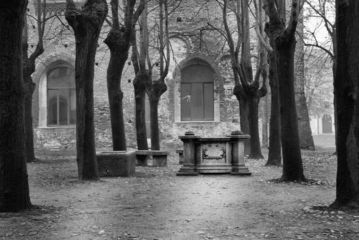 Renaissance monument located in the garden of the Castello Sforzesco of Vigevano, black and white.