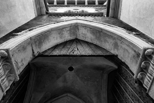The Castello Sforzesco of Vigevano, details of the front  castle door, black and white photo.