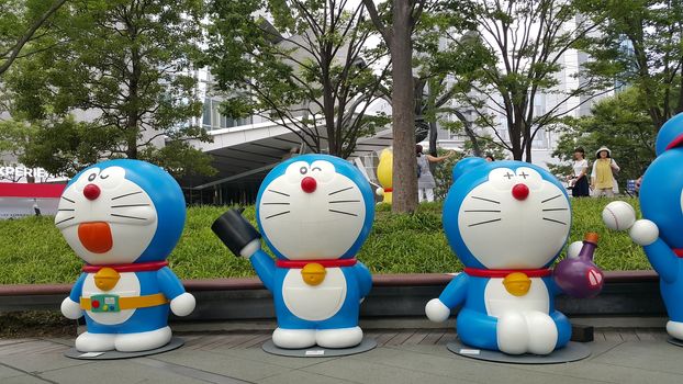 Tokyo, Japan - July 18, 2016: People and their family are enjoy visiting the Doraemon model exhibition held at Roppongi neighborhood, Tokyo.