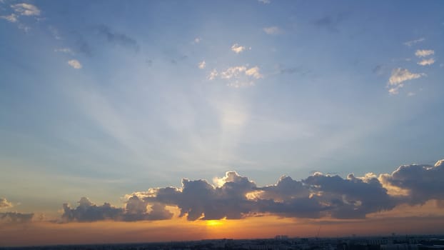 Morning Sun light shine through the dark cloud. Make the magnificent light.