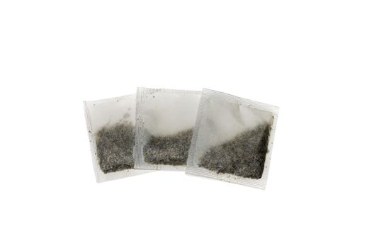 Several tea bags , isolated on white background