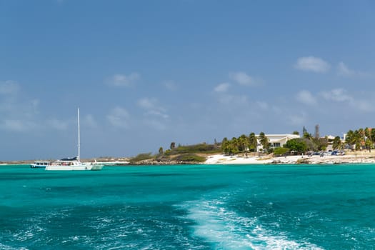 A view from sea back to the coast in Aruba in the Dutch Antilles.