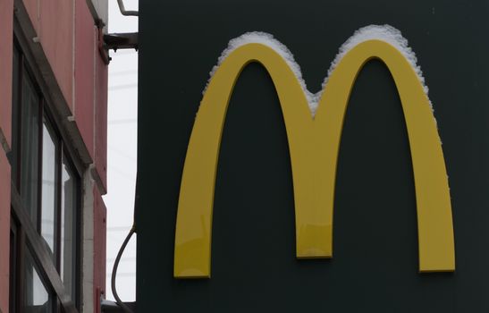 Symbol M McDonald on a dark background 2016