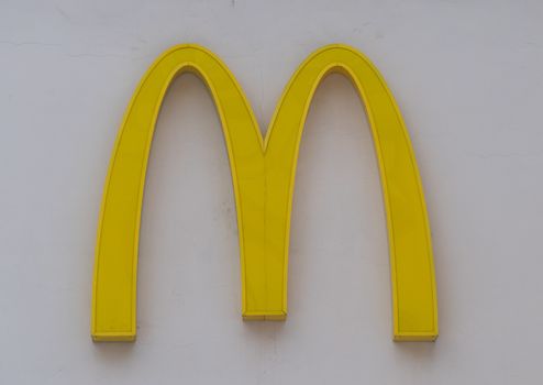 Symbol M McDonald on a light background Russia