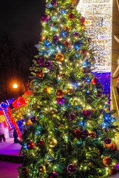 festive decorated Christmas tree in winter Park.