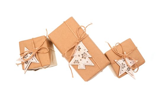 three gift boxes of kraft paper isolated on white background.