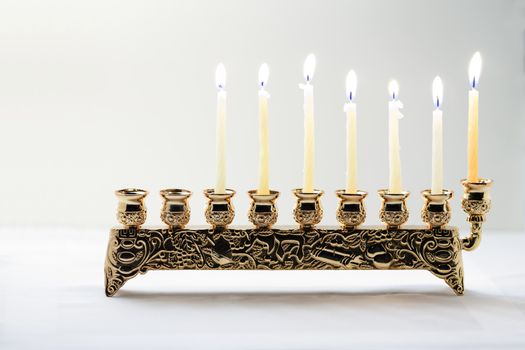 The Symbols of Hanukkah - nine-branched mehorah Hanukiah