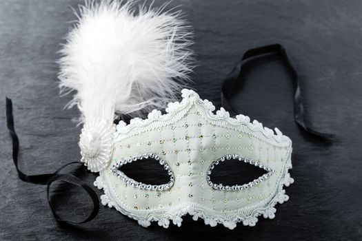 Carnival mask on black background - Symbols of Purim