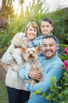 Happy Mixed Race Family Portrait Outdoors.