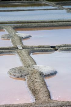 Salt evaporation pond in Guerande. Guerande is small town of Brittany Region in France. Salts farmers produce the world famous salt