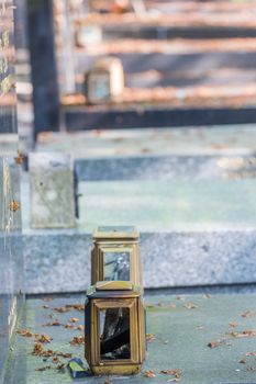 candle lantern on the stone grave