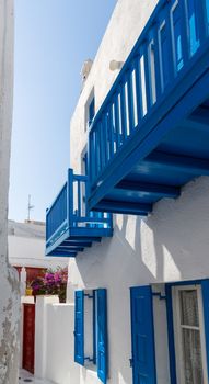 Blue terrace on a white washed walled house in Mykonos in Greece - traditionally Greek