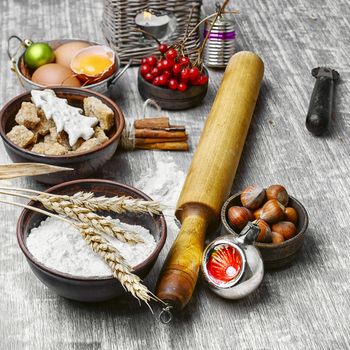 Basic baking ingredients for Christmas cooking.Eggs,brown sugar and wheat flour.