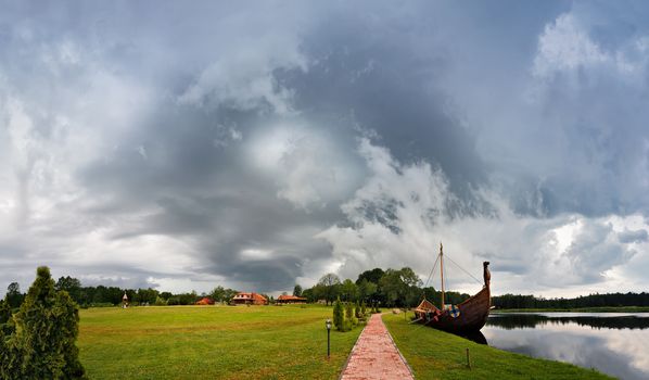 Summer storm landscape. Dramatic cloudy sky. Hurricane and rain in Belarus