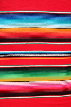 Mexico traditional cinco de mayo rug poncho fiesta background with stripes copy space