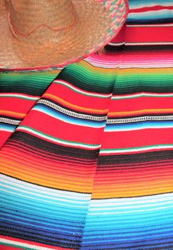 Mexico traditional cinco de mayo rug poncho fiesta background with stripes copy space