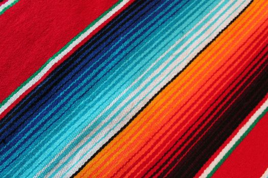 Mexico traditional cinco de mayo rug poncho fiesta background with stripes copy space