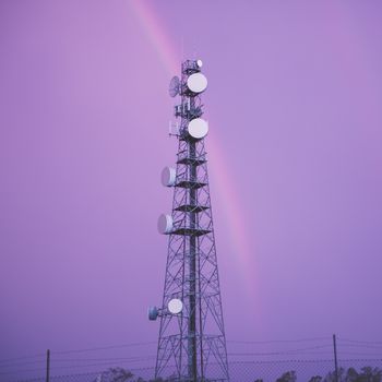 Radio tower in the after a storm with a rainbow in Redbank Plains, Brisbane, Queensland.