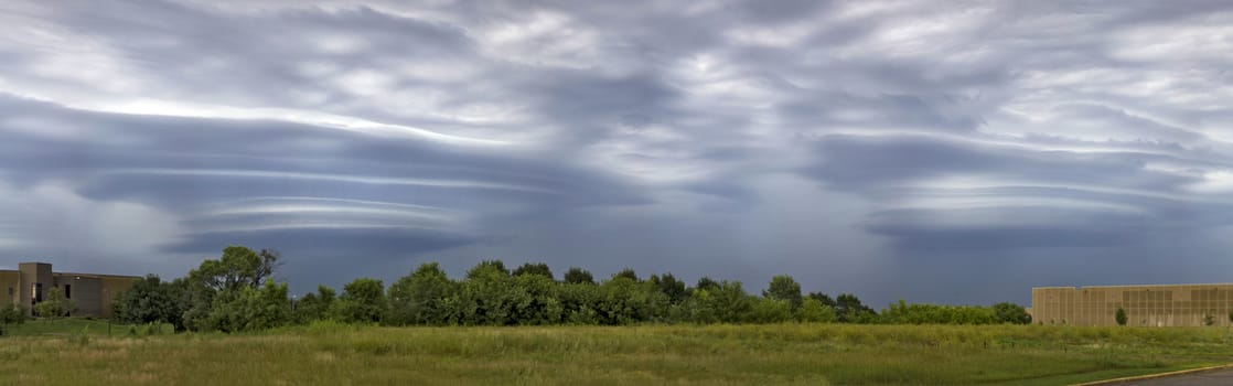 Two lateral clouds before a storm.