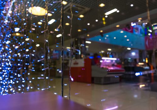 Shopping Mall Interior, Christmas Shopping Mall Defocused Background, Shopping Center, Abstract Blur Image of Shopping Mall and People on Christmas Time for Background