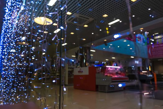 Shopping Mall Interior, Christmas Shopping Mall Defocused Background, Shopping Center, Abstract Blur Image of Shopping Mall and People on Christmas Time for Background