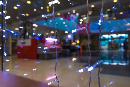 Shopping Mall Interior, Christmas Shopping Mall Defocused Background, Shopping Center, Abstract Blur Image of Shopping Mall and People on Christmas Time for Background