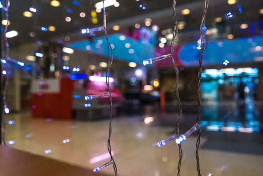 Shopping Mall Interior, Christmas Shopping Mall Defocused Background, Shopping Center, Abstract Blur Image of Shopping Mall and People on Christmas Time for Background