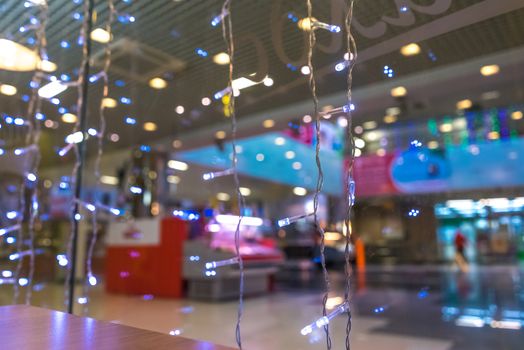 Shopping Mall Interior, Christmas Shopping Mall Defocused Background, Shopping Center, Abstract Blur Image of Shopping Mall and People on Christmas Time for Background